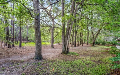 Private, spacious Royal Pines home with added rear porch and - photo 33