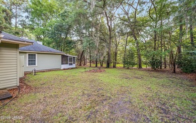 Private, spacious Royal Pines home with added rear porch and - photo 34
