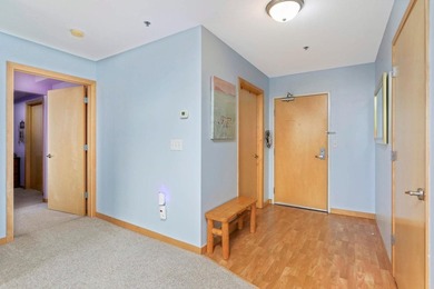 Welcome to unit #702! This top-floor unit offers an open concept - photo 3