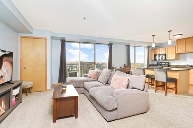 Welcome to unit #702! This top-floor unit offers an open concept - photo 9