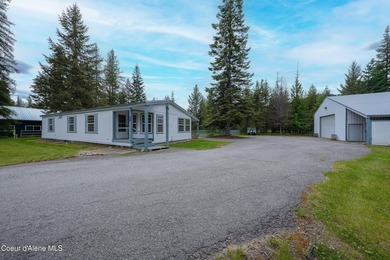 Enjoy peaceful Priest Lake living in this charming, newly - photo 1