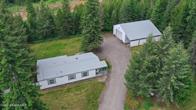 Enjoy peaceful Priest Lake living in this charming, newly - photo 4
