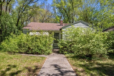 Nestled among the trees in beautiful Burlington, this charming - photo 1