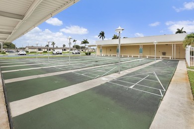 Welcome to this charming 1-bedroom, 1.5-bath villa offering - photo 25