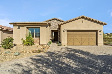 Located in a gorgeous, gated North Scottsdale community, this