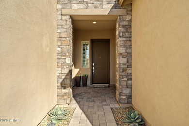 Located in a gorgeous, gated North Scottsdale community, this