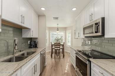 Welcome to your dream home-an impeccably updated 3-bed, 2-bath