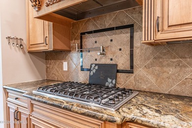 Sprawling, golf-front estate home in the gated community of Mid - photo 11