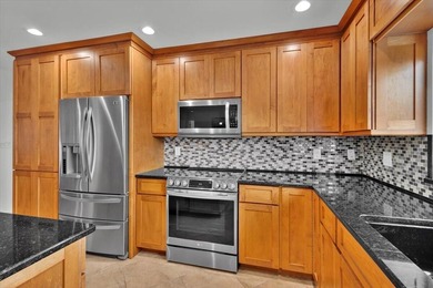 Beautifully maintained 3 BR, 2.5 BA waterfront home with 94' of - photo 14