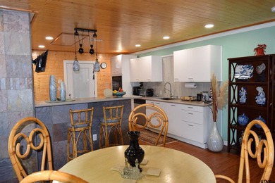 Enjoy the perfect blend of lake life, spacious yard and private - photo 17