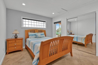 Beautifully maintained 3 BR, 2.5 BA waterfront home with 94' of - photo 39