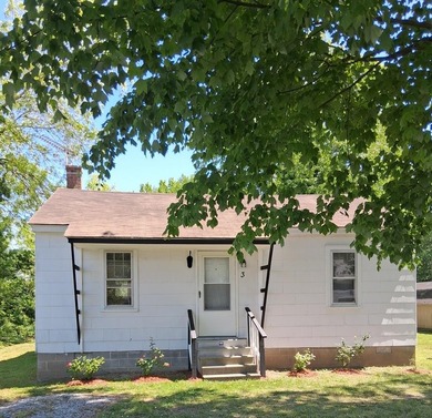 Affordable 2-bedroom Bungalow sits in the heart of a vibrant - photo 1