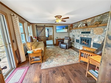 Lake of the Ozarks waterfront property featuring natural stone - photo 11