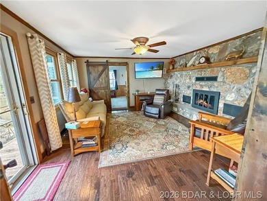 Lake of the Ozarks waterfront property featuring natural stone - photo 11