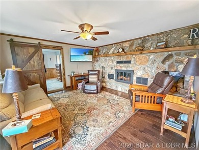 Lake of the Ozarks waterfront property featuring natural stone - photo 12