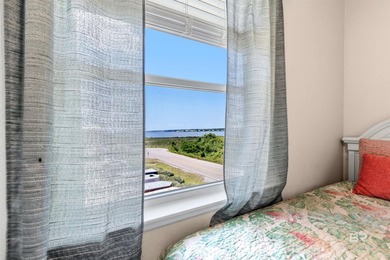 Top-floor corner unit with Gulf views and Little Lagoon views! - photo 18