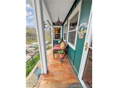 Lake of the Ozarks waterfront property featuring natural stone - photo 29