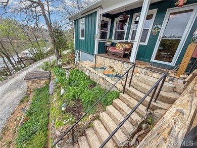 Lake of the Ozarks waterfront property featuring natural stone - photo 30