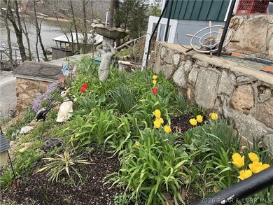 Lake of the Ozarks waterfront property featuring natural stone - photo 31