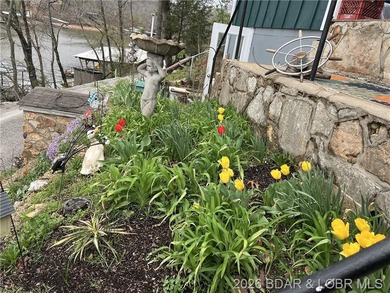 Lake of the Ozarks waterfront property featuring natural stone - photo 31