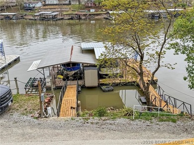 Lake of the Ozarks waterfront property featuring natural stone - photo 32