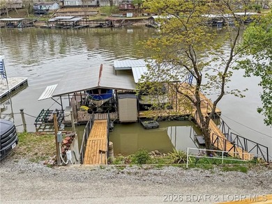 Lake of the Ozarks waterfront property featuring natural stone - photo 32