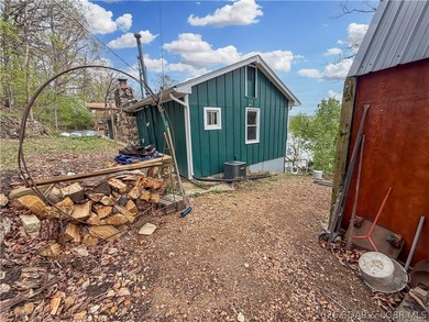Lake of the Ozarks waterfront property featuring natural stone - photo 48