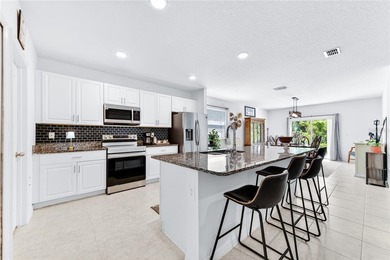 Step into this like-new 2021 concrete-block home featuring 4 - photo 12