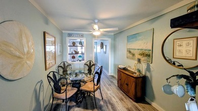 Escape to this beautifully renovated coastal getaway, offered - photo 12