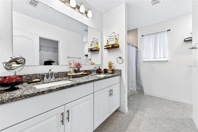 Step into this like-new 2021 concrete-block home featuring 4 - photo 22