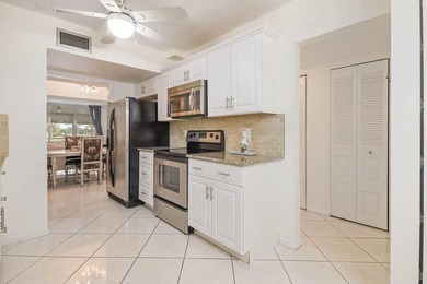 WELCOME TO THIS NATURALLY BRIGHT CONDO WITH SOUTH FACING BALCONY - photo 10