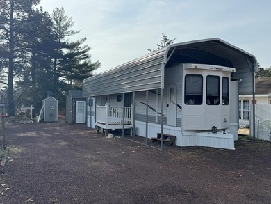 Cleared lot with stone down. Two bedroom one bathroom park - photo 1