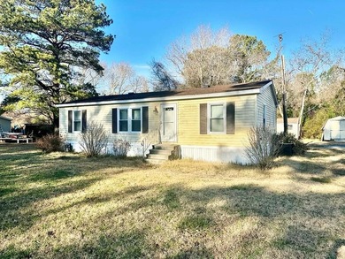 Centrally located doublewide situated on approximately 0.51 - photo 1