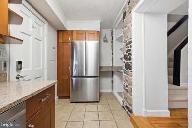 Welcome to 871 Oella Avenue, a truly exceptional four-level - photo 8