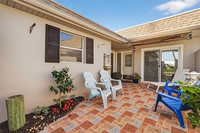 NOW OFFERED FURNISHED! Fully remodeled waterfront villa located - photo 3