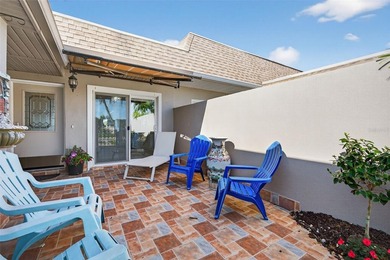 NOW OFFERED FURNISHED! Fully remodeled waterfront villa located - photo 4
