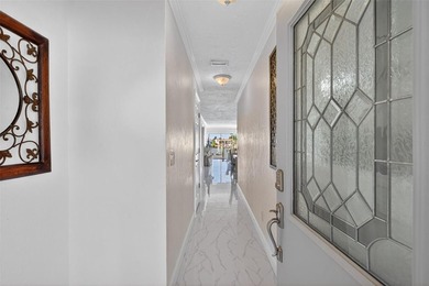 NOW OFFERED FURNISHED! Fully remodeled waterfront villa located - photo 8