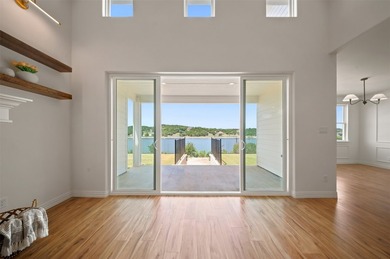 Discover your dream lakeside home featuring almost 300 feet of - photo 12