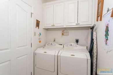 Enjoy peaceful golf course living in this well-maintained - photo 12