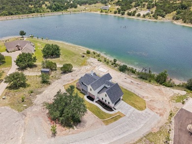 Discover your dream lakeside home featuring almost 300 feet of - photo 31