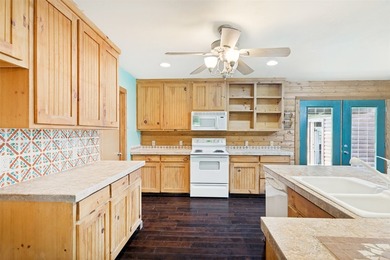 Tucked away on a peaceful 5-acre parcel, this charming one-owner - photo 10