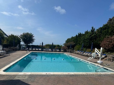 Enjoy crisp water and sunset views over Fort Pond Bay and - photo 21