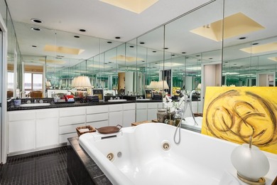 This exceptional condo commands a premium position with sweeping - photo 40