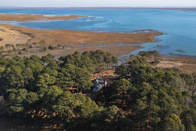 Welcome to this 2,035 sq ft seaside retreat! Discover the - photo 1