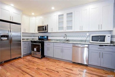 Amazing Turn Key 2 family renovated brick building with 2nd - photo 3