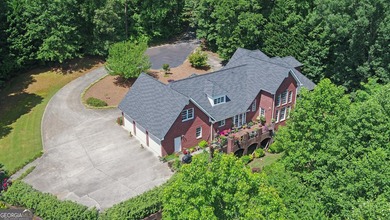 GOLF COMMUNITY MASTERPIECE! Spectacular 4-sided brick home - photo 2