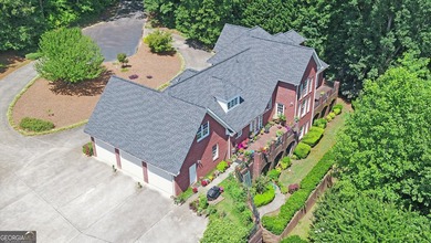 GOLF COMMUNITY MASTERPIECE! Spectacular 4-sided brick home - photo 3