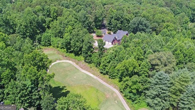 GOLF COMMUNITY MASTERPIECE! Spectacular 4-sided brick home - photo 5