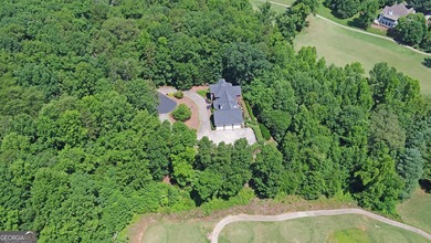 GOLF COMMUNITY MASTERPIECE! Spectacular 4-sided brick home - photo 10