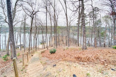 Escape to a world where luxury meets the water's edge. Nestled - photo 50